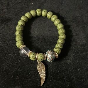 Green Beaded Bracelet with Silver Wing Charm